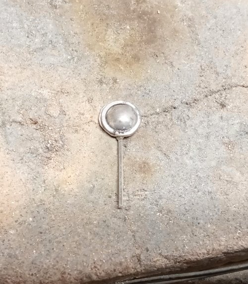 Judy Larson's Domed Stud with Drop Loop - , Metalwork, Cutting, Cutting Tool, Cutters, How To Punch Holes, Hole Punching, Punch A Hole, Stamping, Stamps, Butane Torch, Soldering, Solder, Press the earring down again.